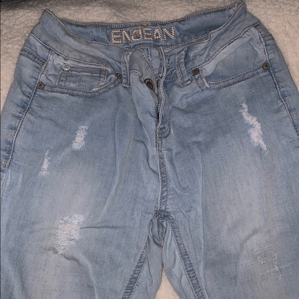 Ripped blue jeans